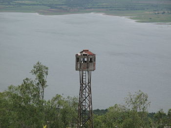 Information sign on land by sea