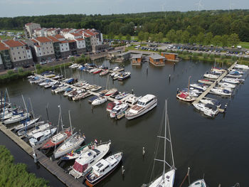 High angle view of boats moored at harbor