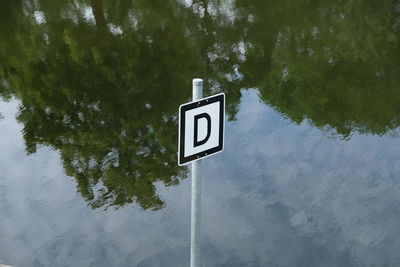 Information sign by lake