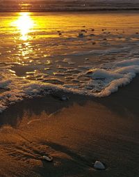 Scenic view of beach during sunset