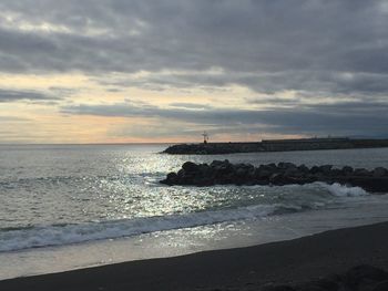 Scenic view of sea against sky during sunset