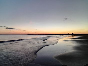 Scenic view of sea at sunset