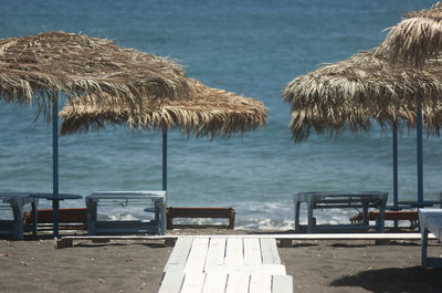 Lounge chairs and parasols on beach