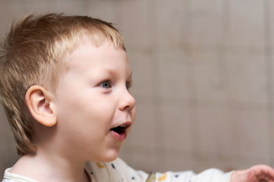 Portrait of cute boy looking away