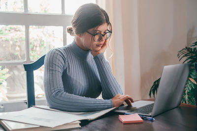 Businesswoman working at office