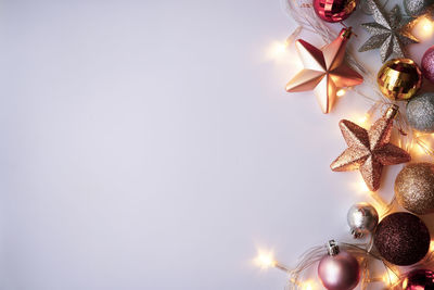 Low angle view of christmas lights against sky