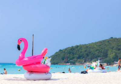 View of beach against blue sky