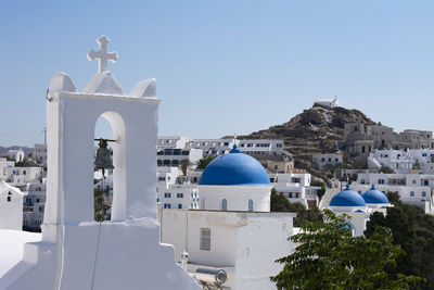 View of church in town against sky