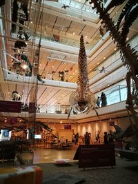 Clothes hanging from ceiling in museum