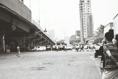Woman standing in city