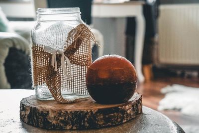 Close-up of drink in glass jar on table