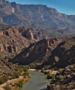 High angle view of river passing through mountains