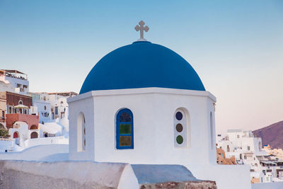 Traditional dome of the churches at oia city in santorini island