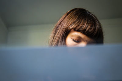 Close-up of woman at home