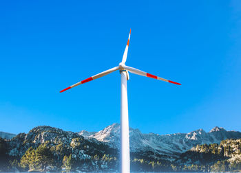 Wind turbine part of the mountain landscape. wind energy in mountainous region . green energy power