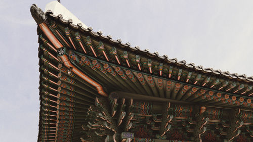 Low angle view of roof against sky