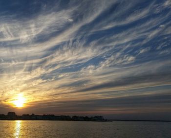 Scenic view of sea at sunset