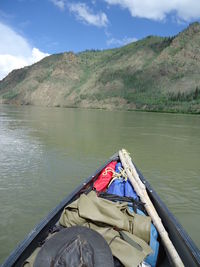 Boat on lake against sky