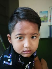 Close-up portrait of cute boy