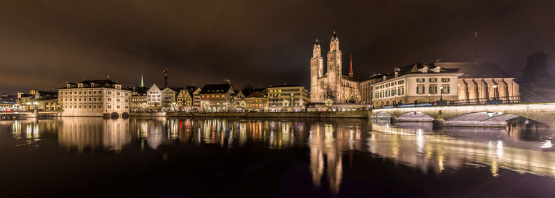 Reflection of illuminated buildings in water