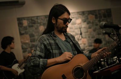 Young man playing guitar