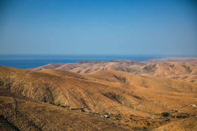 Scenic view of landscape against clear sky