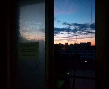 View of cityscape through window