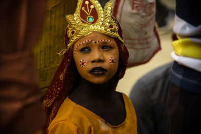 Close-up of girl with traditional make-up