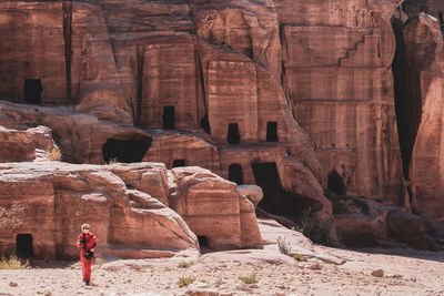 People standing on rock