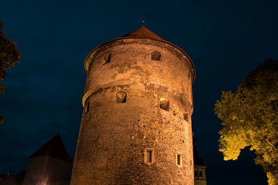 Low angle view of building against sky at night