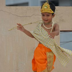 Portrait of cute girl holding umbrella