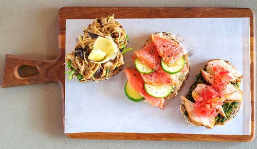 Close-up high angle view of starters on chopping board