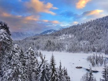 Scenic view of snow covered landscape against sky