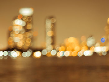 Defocus blur city night lights colorful bokeh abstract capital city architecture background.
