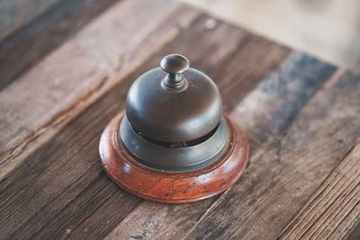 High angle view of old tea light on table