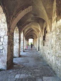 People walking in tunnel