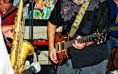 Group of people playing guitar