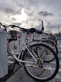 Bicycle against sky in city