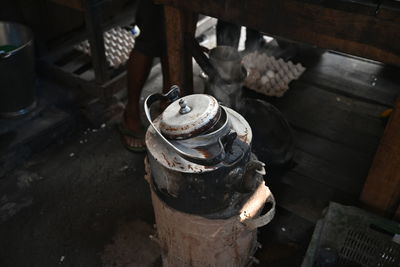 Making indian style hot tea or chai for customers on the street.