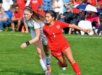 Full length of women on soccer field