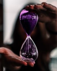 Close-up of hourglass on table