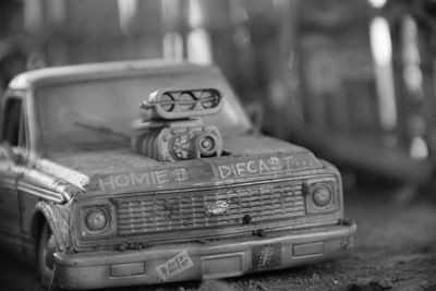 Close-up of abandoned toy car