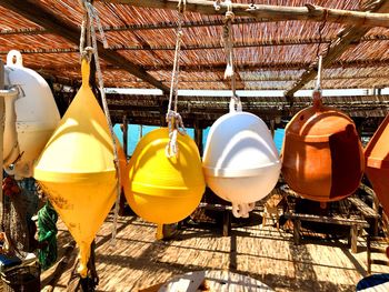 Buoys hanging from bamboo