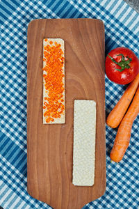 High angle view of bread on cutting board