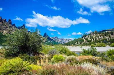 Scenic view of mountains against cloudy sky