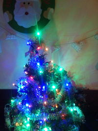 Illuminated christmas tree at home