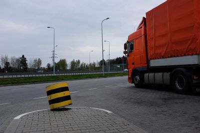 Bus on road against sky