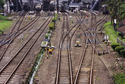High angle view of railroad tracks amidst train