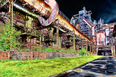 Full frame shot of abandoned building against sky at night