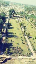 High angle view of road passing through field